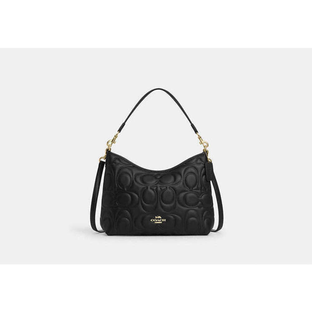 Laurel Shoulder Bag In Signature Leather. Brand new never worn free charm w purc